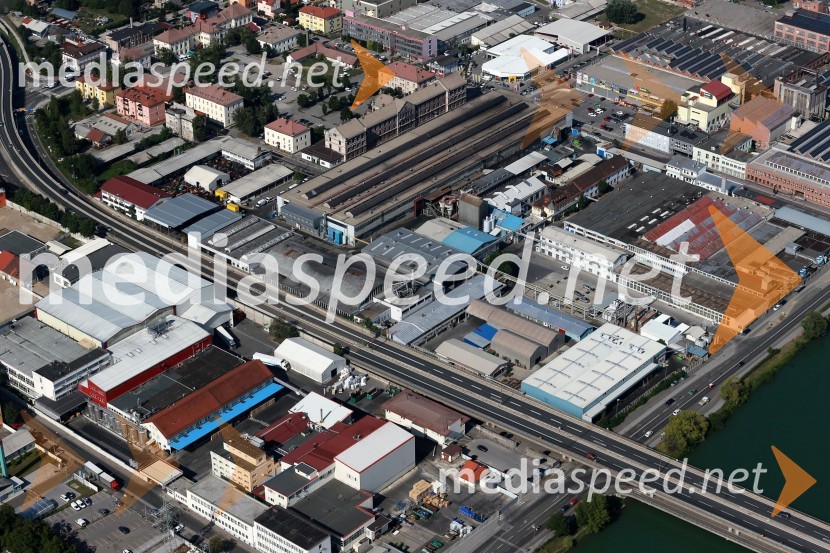 Maribor Melje: Žito Intes d.d., Henkel Slovenija d.o.o., MLM d.d. Mariborska livarna Maribor, Košaki Tovarna mesnih izdelkov d.d., Oreško nabrežje, reka Drava, železniški most, dvoetažni most&nbsp;Maribor in okolica iz zraka