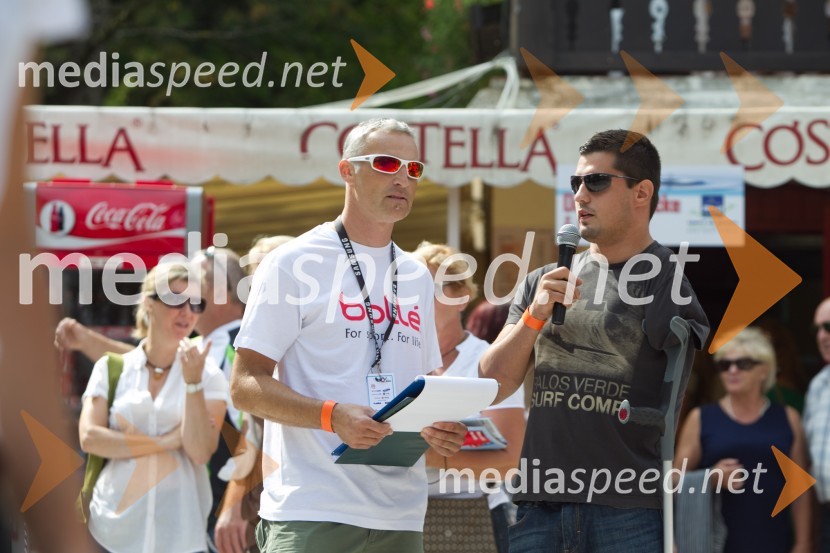 Gregor Janežič, voditelj; Darko Đurič, plavalec15. Tek okrog jezera