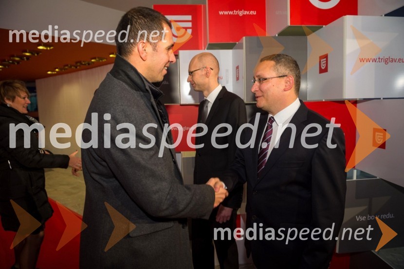 Marko Mlakar, Amrop Adria; Andrej Knap, pomočnik predsednika uprave Zavarovalnice TriglavSlavnostni novoletni koncert Zavarovalnice Triglav