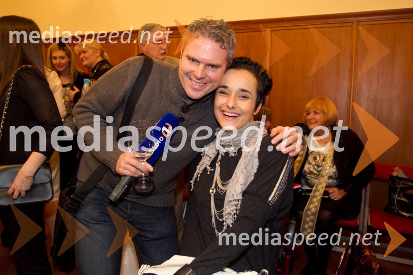 MIha Deželak, novinar; Nina Wabra JakičSlovenka leta 2013 je Eugenija Carl