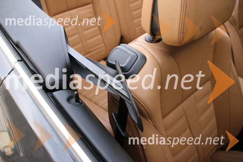 Opel Cascada 1.6 SIDI Cosmo, varnostni pas se z mehanizmom približa potnikuOpel Cascada 1.6 SIDI Cosmo, mediaspeed test