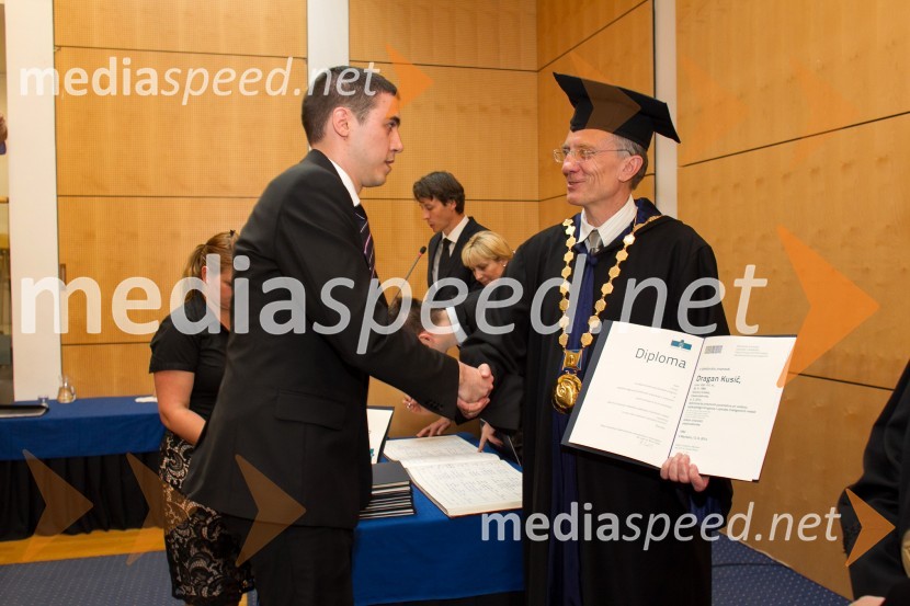 dr. Dragan Kusić, Fakulteta za elektrotehniko, računalništvo in informatiko, Univerza v Mariboru; prof. dr.  Danijel Rebolj, rektor Univerze v MariboruPromocija doktorjev znanosti UM, junij 2014