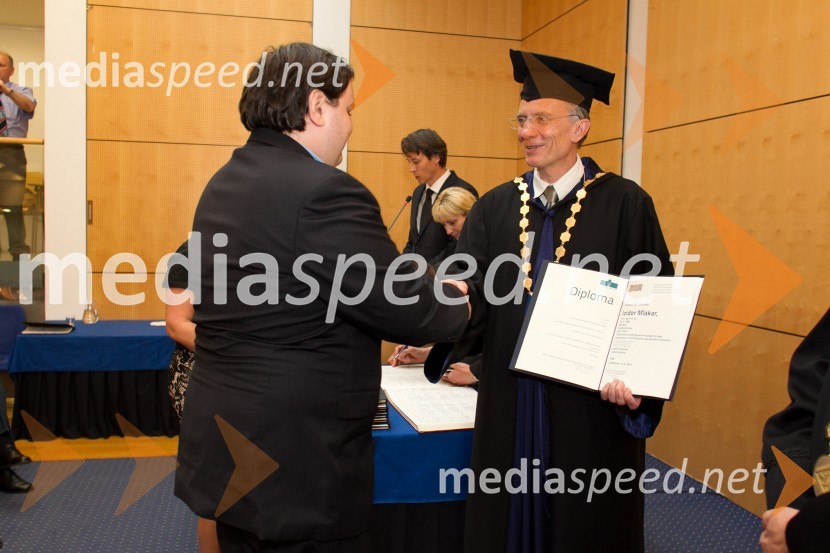 dr. Izidor Mlakar, Fakulteta za elektrotehniko, računalništvo in informatiko, Univerza v Mariboru; prof. dr.  Danijel Rebolj, rektor Univerze v MariboruPromocija doktorjev znanosti UM, junij 2014