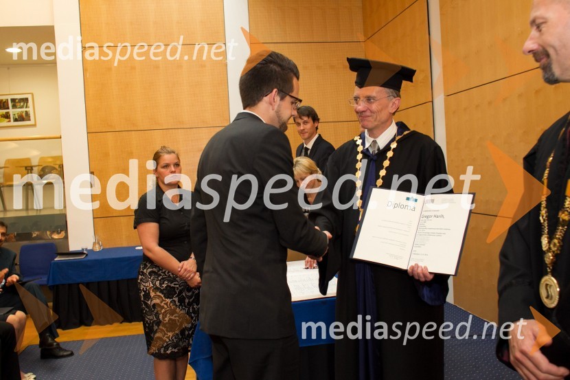 doc. dr. Gregor Harih, Fakulteta za strojništvo, Univerza v Mariboru; prof. dr.  Danijel Rebolj, rektor Univerze v MariboruPromocija doktorjev znanosti UM, junij 2014