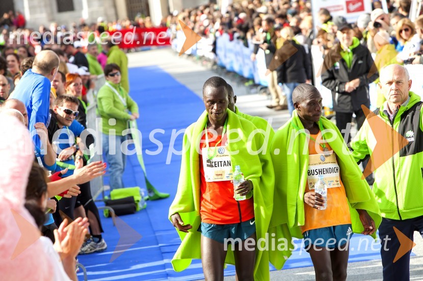  Elijah Keitany, maratonec (2. mesto, 42 km, moški);  Ishimael Bushendich, maratonec (1. mesto, 42 km, moški)Volkswagen 19. Ljubljanski maraton 2014