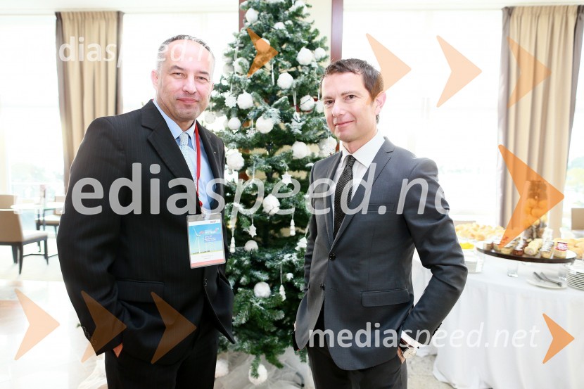  Primož Kapus, direktor podjetja Amicus;  Tomaž Orešič, VaasaETT, predsedujoči konferenci Energija14Energija14, 10. mednarodna konferenca o energiji
