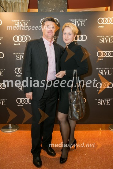  Jernej Dragoš,  direktor znamke Porsche pri podjetju Porsche Slovenija d.o.o.;  Janina Erhart DragošPetdeset odtenkov sive, VIP predpremiera filma