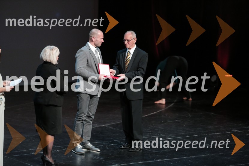  Samo Petrač;  Miroslav Cerar, nekdanji gimnastičar, predsednik Odbora za podeljevanje Bloudkovih priznanj50. podelitev Bloudkovih priznanj za leto 2014