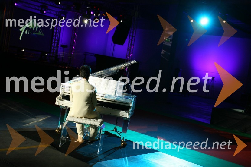 PianistOtvoritev novih poslovnih prostorov podjetja MIK Celje v Vojniku