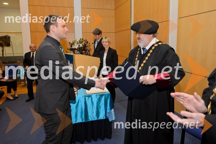 dr. Aleš Černezel, Fakulteta za elektrotehniko, računalništvo in informatiko; prof. dr. Igor Tičar, rektor, Univerza v MariboruPromocija doktorjev znanosti na UM, december 2016