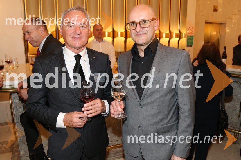  Janez Polanec, višji sodnik in predsednik Rotary kluba Maribor, prejemnik priznanja PHF Paul Harris Fellow; mag. Tomaž Gaube, direktor in solastnik agencije Kraft & WerkRotary klub,  25. obletnica kluba