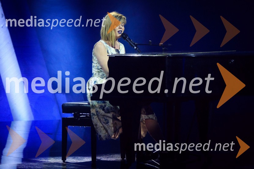  Jana Šušteršič, pevka, zmagovalka šova Slovenija ima talent 2014Zmagovalka 41. Popevke je Nuška Drašček