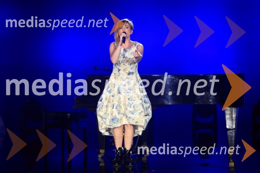  Jana Šušteršič, pevka, zmagovalka šova Slovenija ima talent 2014Zmagovalka 41. Popevke je Nuška Drašček