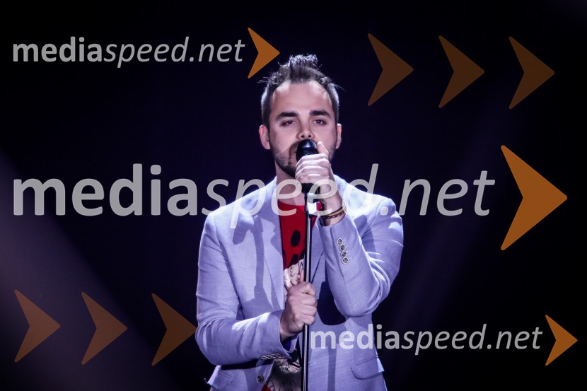  Žiga Rustja, pevec, moderator Radia CaprisZmagovalka Dnevov slovenske zabavne glasbe, Poprock je Anabel