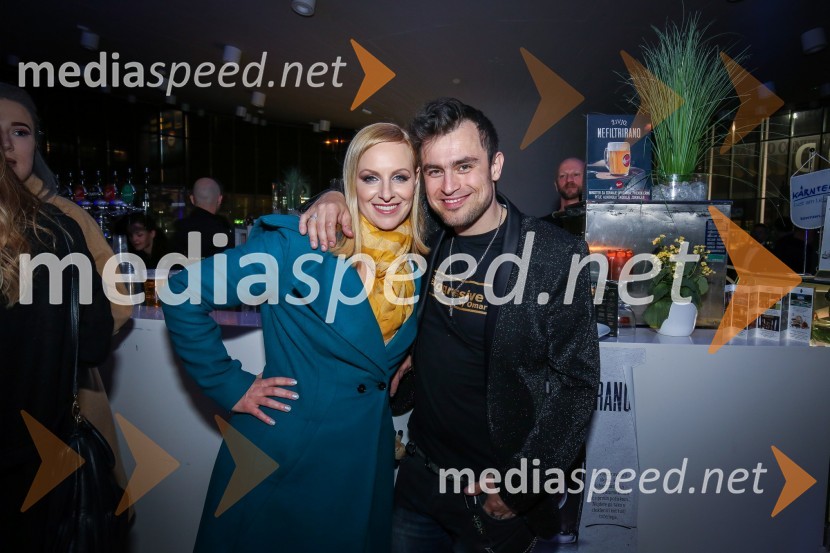  Anja Križnik Tomažin, voditeljica;  Omar Naber, glasbenikZmagovalka Dnevov slovenske zabavne glasbe, Poprock je Anabel