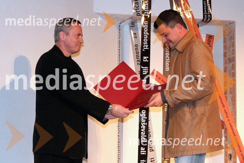 Boris Vugrinec, urednik fotografije pri Večeru in Tit Košir, fotograf Večera in prejemnik novinarske nagradePodelitev novinarskih nagrad Društva novinarjev Slovenije