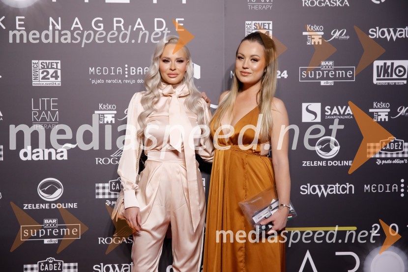  Doroteja Premužič, vizažistka;  Katarina Benček, social media influencerka, lastnica Urbanega ObešalnikaŽarometi 2018, rdeča preproga