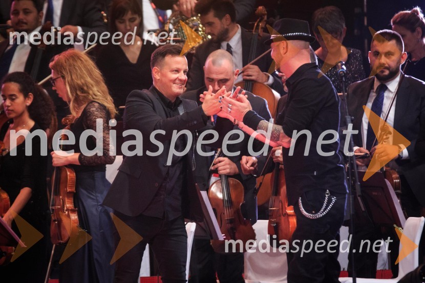  Rok Golob, skladatelj, dirigent in aranžer, King Foo;  Tomi Meglič, glasbenik, pevec skupine SiddhartaSimfonična ekstaza 2, unikatni glasbeni spektakel