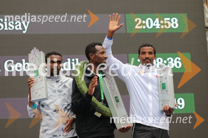  Abraha Adihana Gebretsadik, tekač;  Lemma Kasaye Sisay, tekač;  Tewelde Hiskel, tekačNa 23. ljubljanskem maratonu slavila Etiopijec in Kenijka