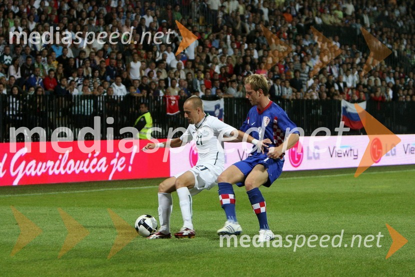 Mišo Brečko, slovenski nogometaš in Ivan Rakitić, hrvaški nogometašSlovenija : Hrvaška, nogomet, prijateljska tekma, zakulisje