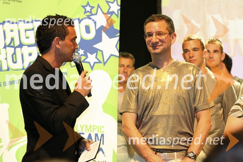 Gregor Murn, voditelj večera in moderator Radia Belvi in Rajmond Debevec, dobitnik bronaste medalje z malokalibrsko puško v trojnem položajuSprejem slovenske olimpijske reprezentance v Ljubljani