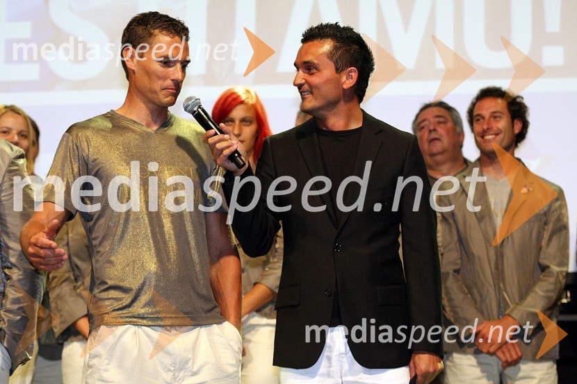 Gregor Murn, voditelj večera in moderator Radia Belvi in Vasilij Žbogar, dobitnik srebrne medalje v jadranjuSprejem slovenske olimpijske reprezentance v Ljubljani