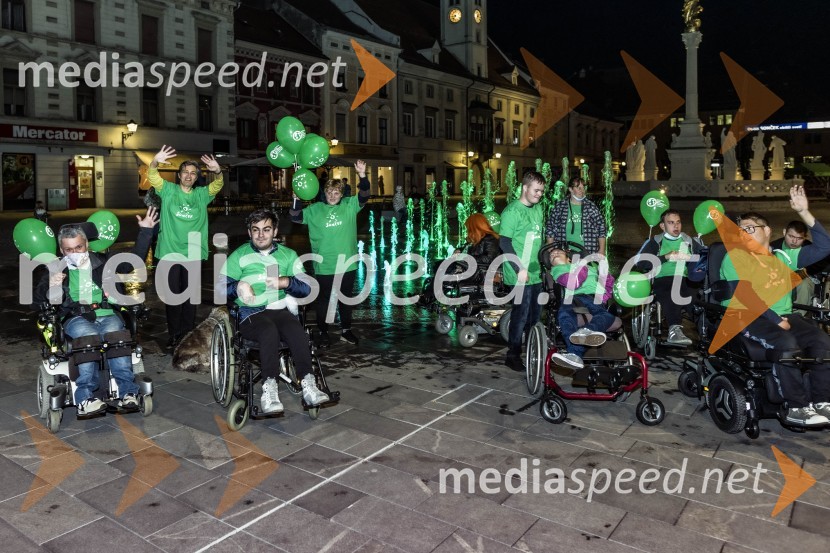  ... ;  Jasna Murgel, doktorica pravnih znanosti, bivša poslanka v državnem zboru;  ... ;  ... ;  ... ;  ... ;  ... ;  ... ;  ... Zeleno obarvan Mariborski grad in fontana na Glavnem trgu ob svetovnem dnevu cerebralne paralize