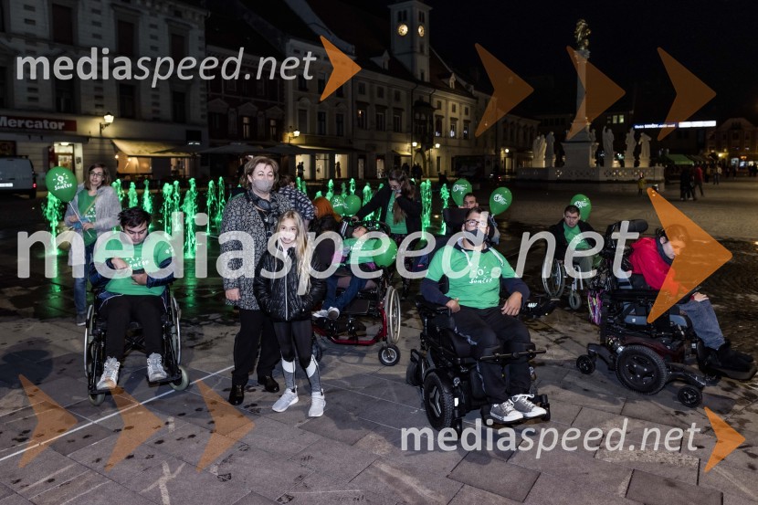  ... ; mag. Helena  Kujundžić Lukaček, podžupanja Mestne občine Maribor;  ... ;  ... ;  ... Zeleno obarvan Mariborski grad in fontana na Glavnem trgu ob svetovnem dnevu cerebralne paralize