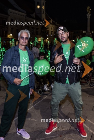  Rok Vilčnik, pesnik, dramatik, glasbenik;  Boštjan Čukur, raper, 6 Pack ČukurZeleno obarvan Mariborski grad in fontana na Glavnem trgu ob svetovnem dnevu cerebralne paralize