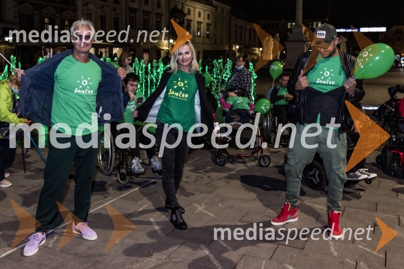  Rok Vilčnik, pesnik, dramatik, glasbenik;  Lidija Šestak Zorič, predsednica društva Sonček Maribor;  Boštjan Čukur, raper, 6 Pack ČukurZeleno obarvan Mariborski grad in fontana na Glavnem trgu ob svetovnem dnevu cerebralne paralize