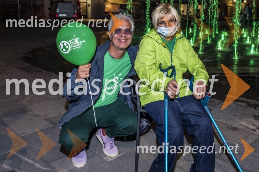  Rok Vilčnik, pesnik, dramatik, glasbenik;  Nives Brešan, uporabnica VDC SončekZeleno obarvan Mariborski grad in fontana na Glavnem trgu ob svetovnem dnevu cerebralne paralize