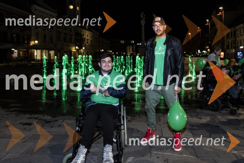  ... ;  Boštjan Čukur, raper, 6 Pack ČukurZeleno obarvan Mariborski grad in fontana na Glavnem trgu ob svetovnem dnevu cerebralne paralize