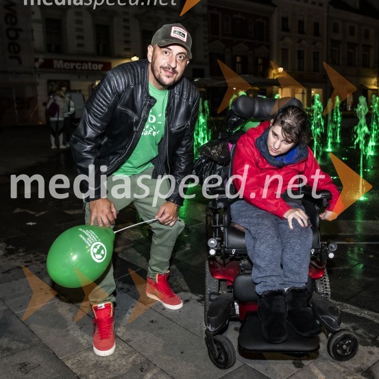  Boštjan Čukur, raper, 6 Pack Čukur;  ... Zeleno obarvan Mariborski grad in fontana na Glavnem trgu ob svetovnem dnevu cerebralne paralize