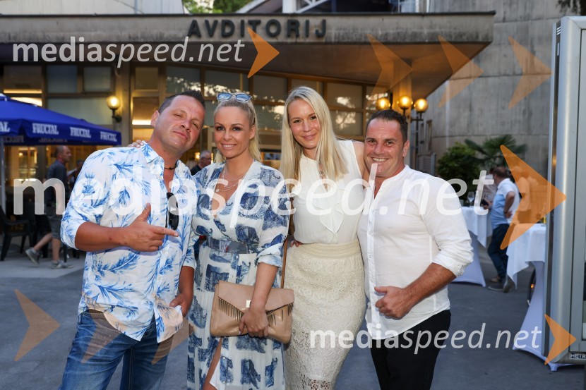 Atomik Harmonik v nekdanji zasedbi, ki je zmagala na MMS leta 2004 s pesmijo Brizgalna brizga 40. Melodije morja in sonca 2021